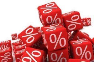 Symbols of percent on red cubes.